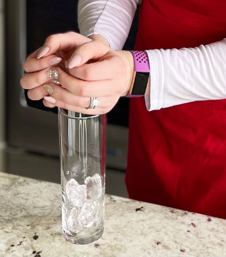 Refreshing Arnold Palmer Spiked Drink 3 Adding Ice To Glass