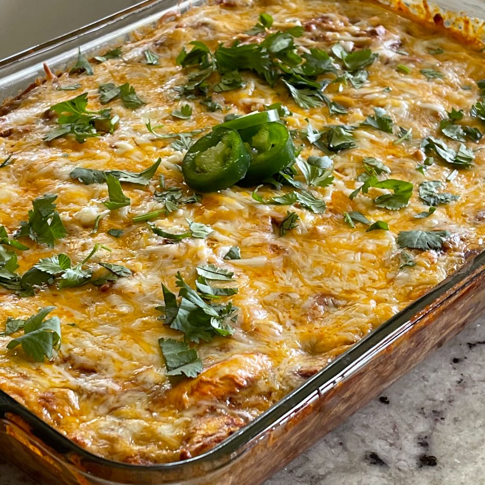 Chicken Enchilada Casserole With Cilantro And JalapeÑO For Garnish