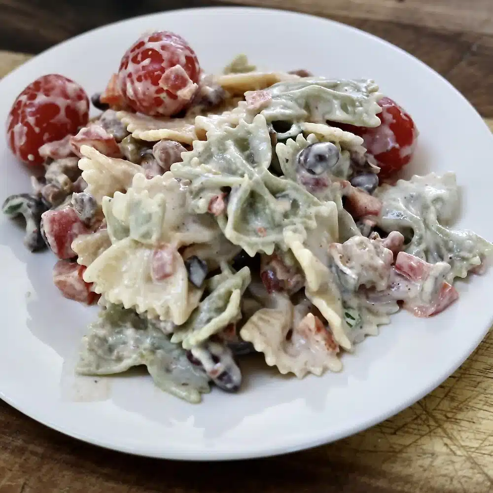 Bacon Ranch Pasta Salad 2 bacon ranch pasta salad on a white plate