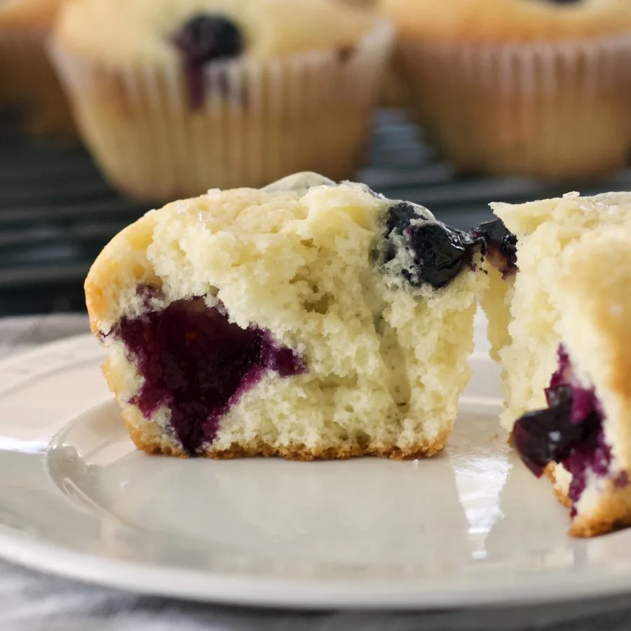 Buttermilk Blueberry Muffins 1 Buttermilk Blueberry Muffin Cut Open On Plate