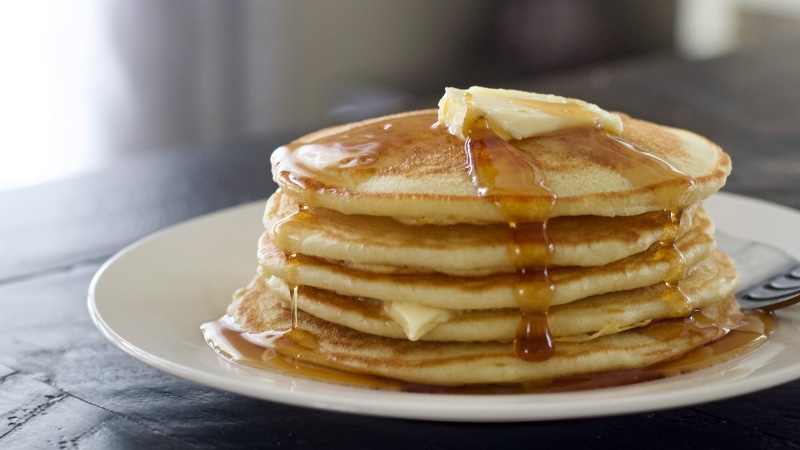 Stack Or Sourdough Pancakes With Syrup And Butter
