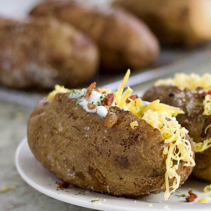 Loaded air fryer baked potatoes