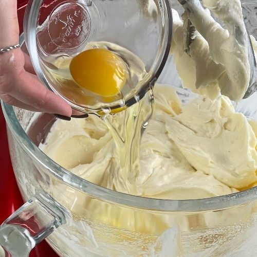 Adding Eggs Into Cheesecake Batter