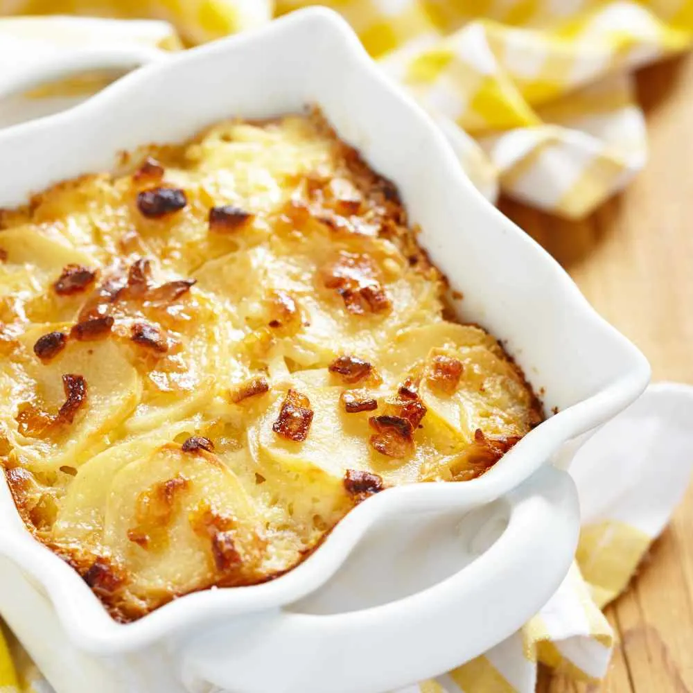 1/2 Of This Scalloped Potatoes Recipe In Small Casserole.