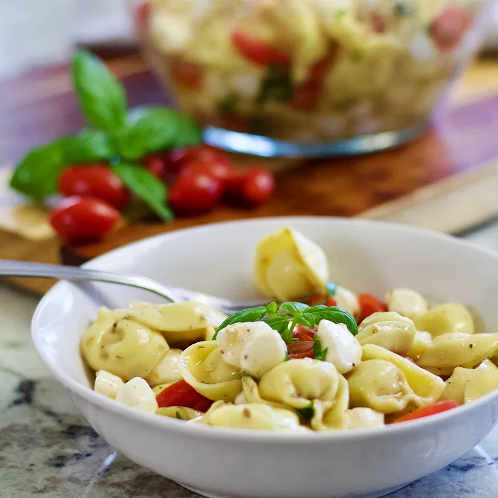 Easy Creamy Sausage Tortellini Soup 13 Tortellini Caprese Salad In Bowl