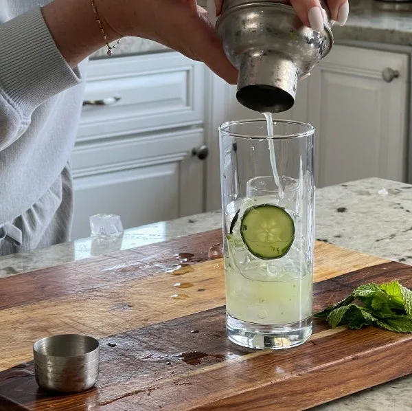 Straining Drink Into Glass