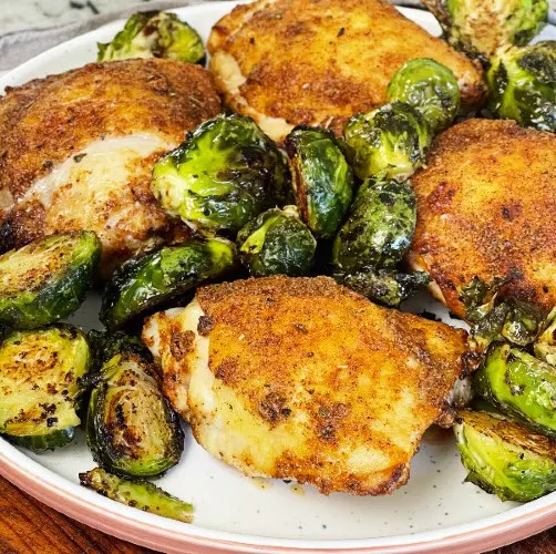 air fryer baked chicken thighs with roasted Brussel sprouts