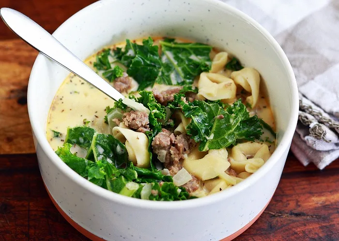 Easy Creamy Sausage Tortellini Soup 3 Creamy Tortellini Soup In White Bowl With Spoon