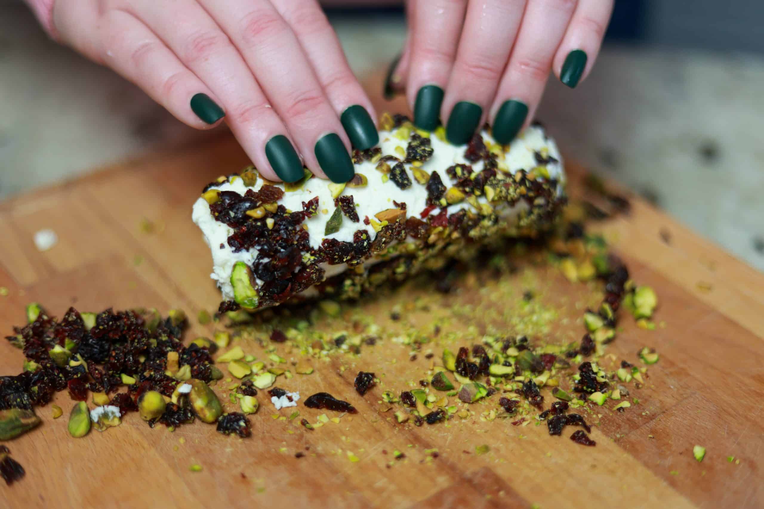 Easy Goat Cheese Appetizer with Cranberries and Pistachios 9 rolling goat cheese appetizer in cranberries and pistachios