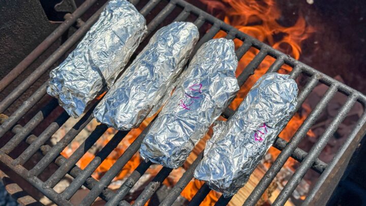 Make-Ahead Camping Breakfast Burritos: Easy, Freezer-Friendly Recipe 7 Making Breakfast Burritos Over Campfire