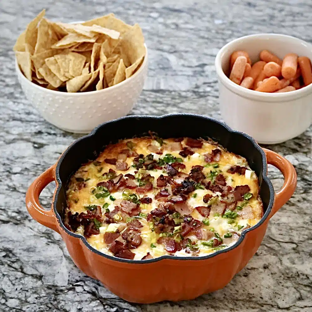 Baked Dip With Bacon. Chips And Carrots To Dip.