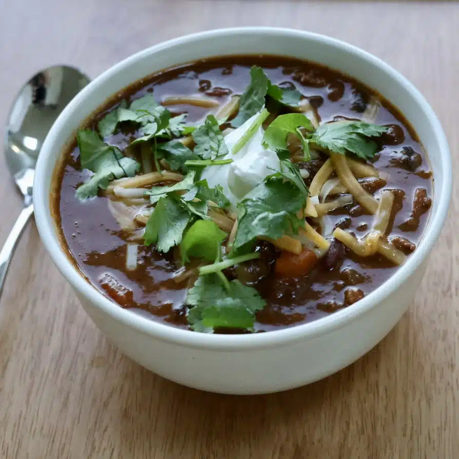 Bowl Of Pumpkin Chili With Toppings