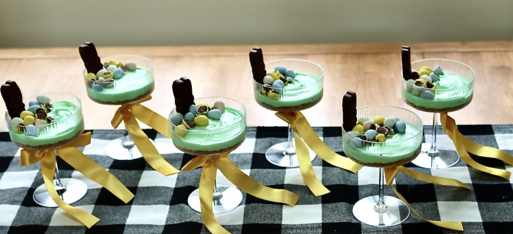 Adorable No Bake Easter Cheesecake Cups 3 No bake Easter Cheesecake cups on a table