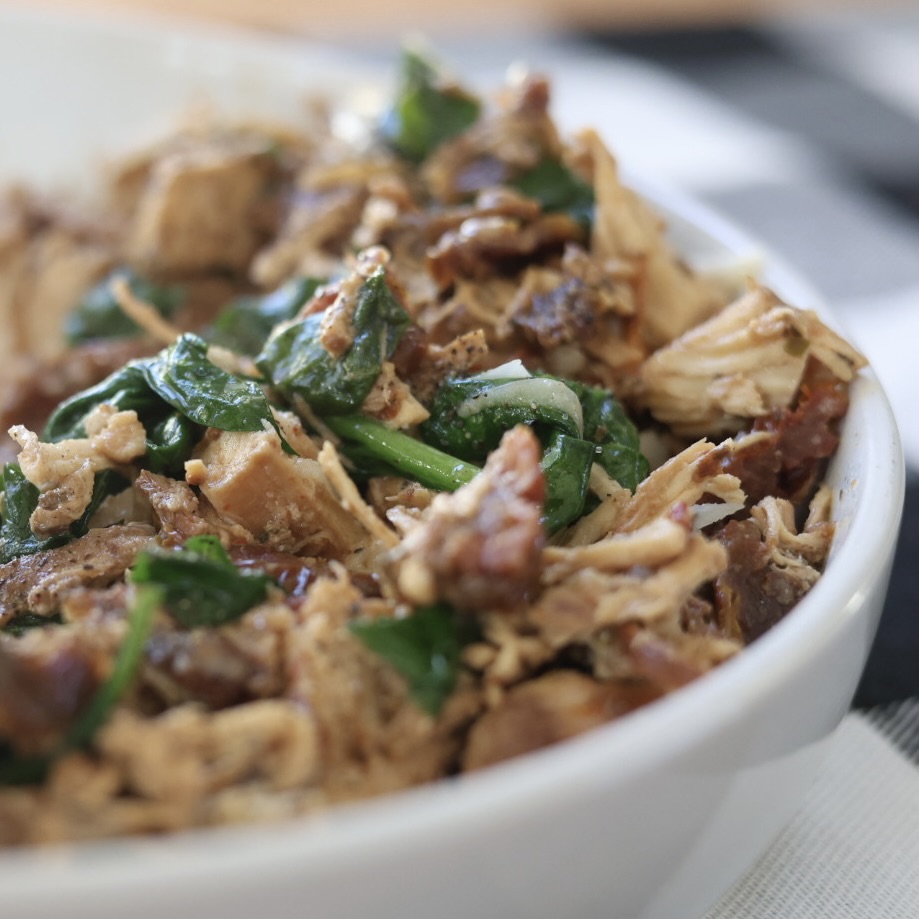 Easy Crockpot Tuscan Chicken (Creamy Slow Cooker Recipe) 3 crockpot Tuscan chicken in a bowl