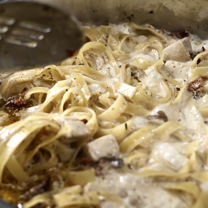 halfway through cooking pasta, stir it up for more even cooking