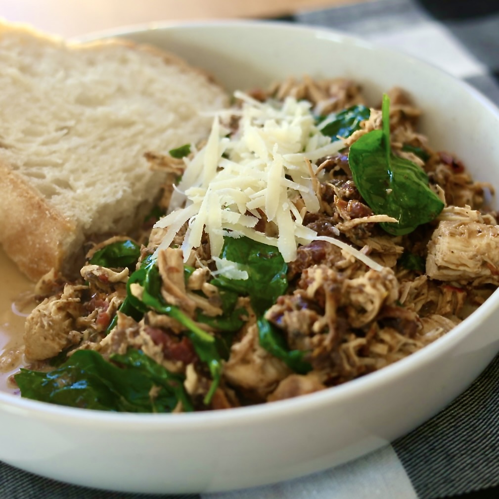 Easy Crockpot Tuscan Chicken (Creamy Slow Cooker Recipe) 5 crockpot tuscan chicken served with bread