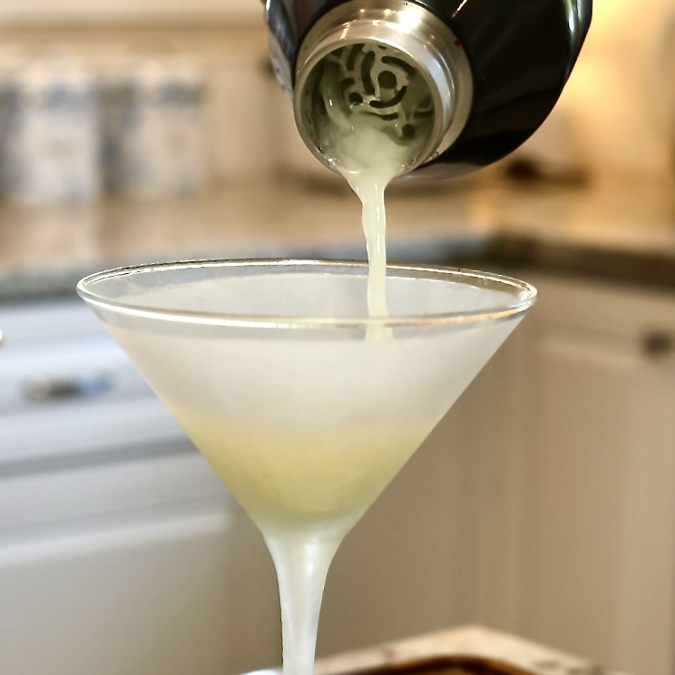 Absolut Tabasco Vodka Martini (Spicy Pickle Martini Recipe) 8 straining a absolut tabasco vodka martini
